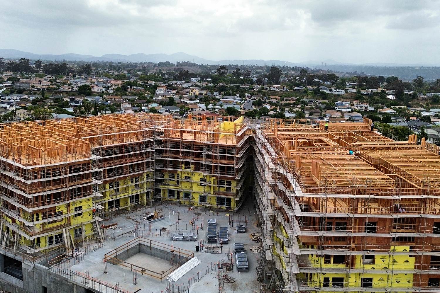 Wide aerial of U-shaped multifamily framing package