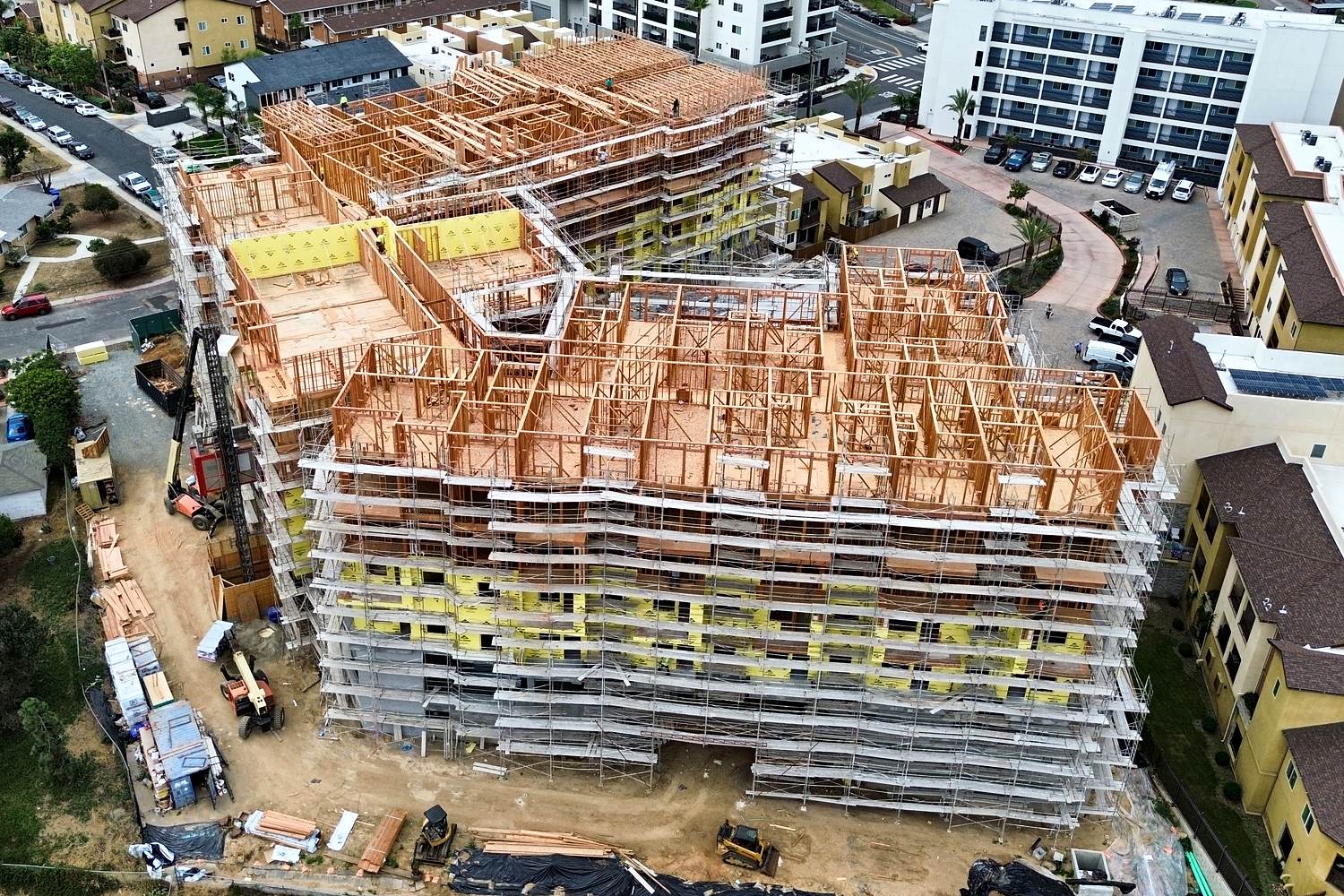 Aerial of mid-rise framing with staging yard