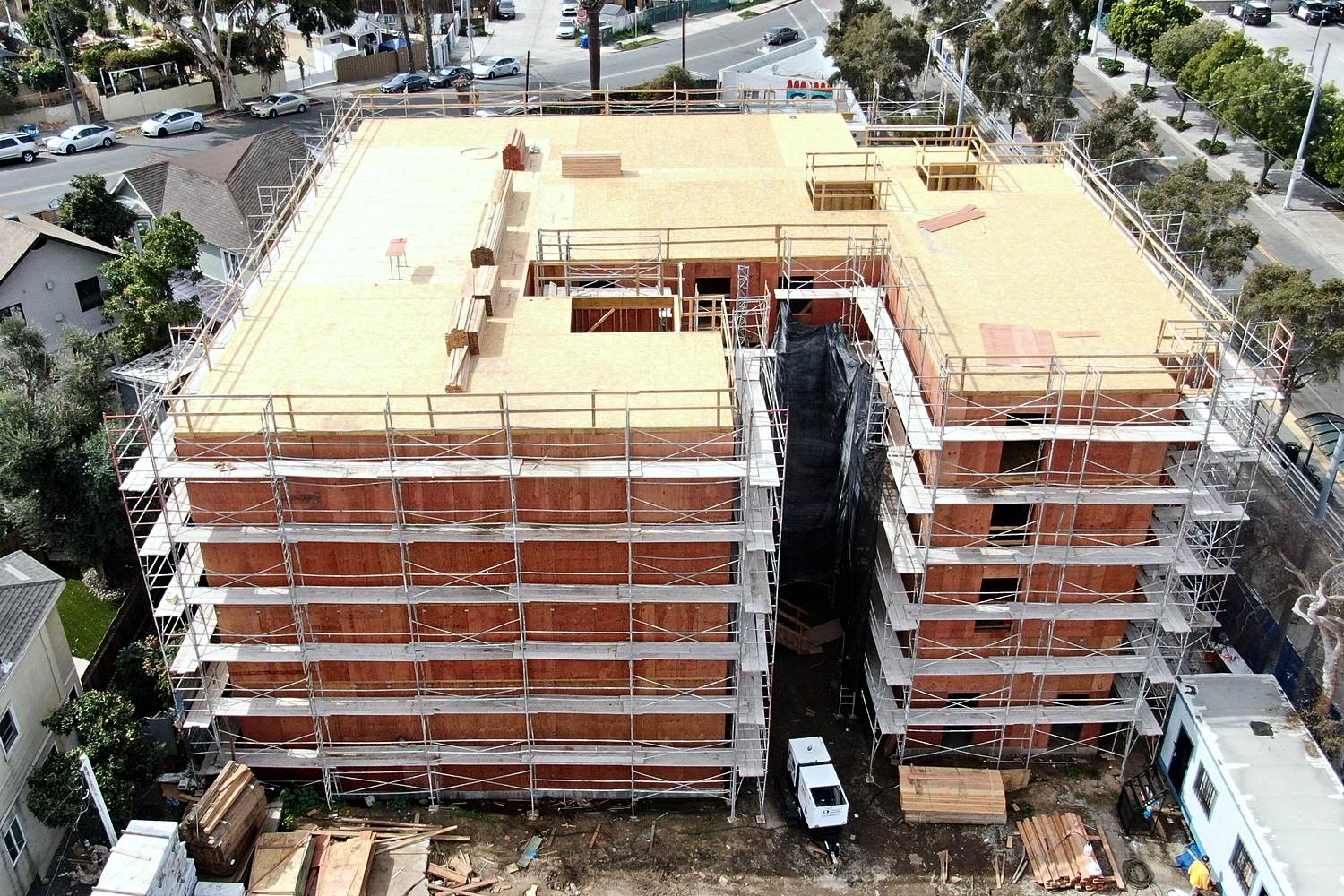 Aerial of sheathed U-shaped multifamily framing